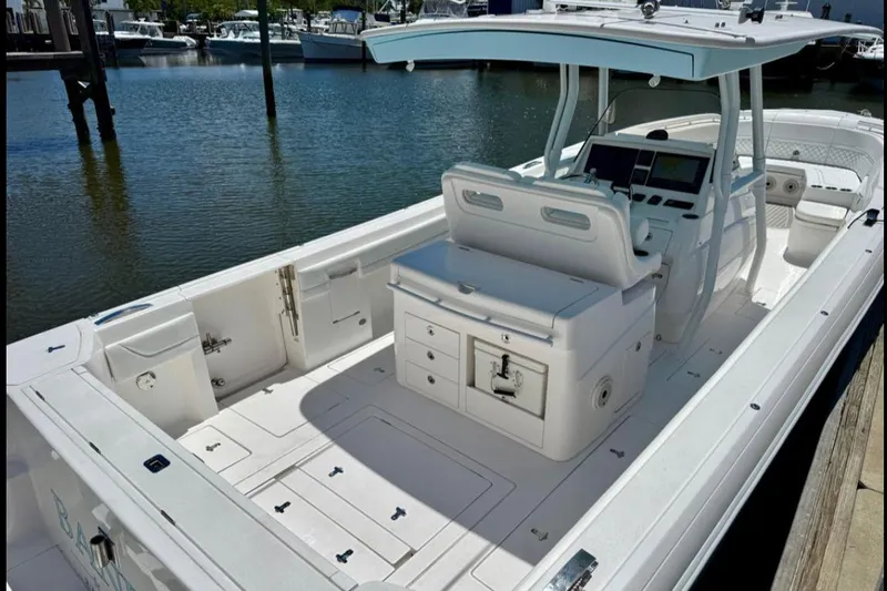 Solete 3 Yacht Photos Pics 2020 Intrepid 375 Nomad FE boat with spacious deck and modern helm at marina.