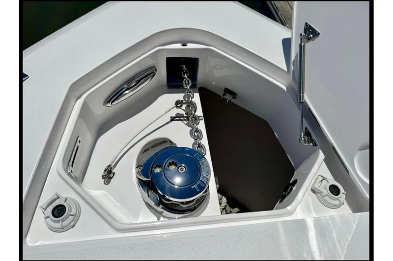 Solete 3 Yacht Photos Pics Anchor compartment of 2020 Intrepid 375 Nomad FE boat, featuring a windlass system.