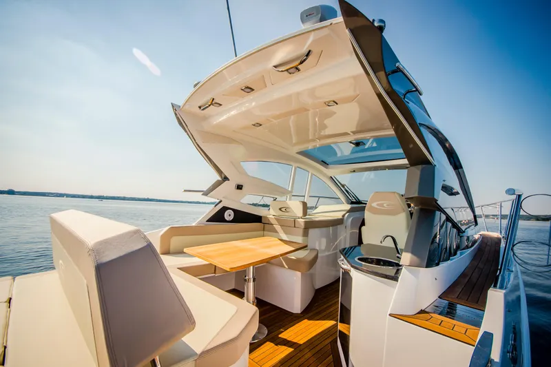 Custom Order Your 33 Ht Today! Yacht Photos Pics Luxurious 2026 Cobrey 33 HT yacht with open deck and modern interior design.