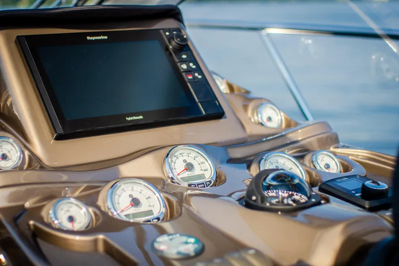 Custom Order Your 33 Ht Today! Yacht Photos Pics Dashboard of 2026 Cobrey 33 HT yacht with navigation instruments and gauges.