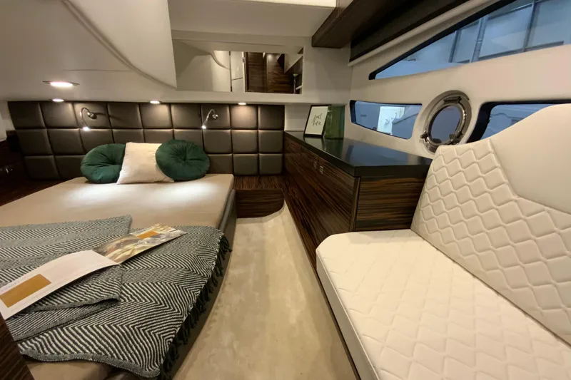 Custom Order Your 33 Ht Today! Yacht Photos Pics Luxurious interior of 2026 Cobrey 33 HT yacht with elegant seating and modern decor.