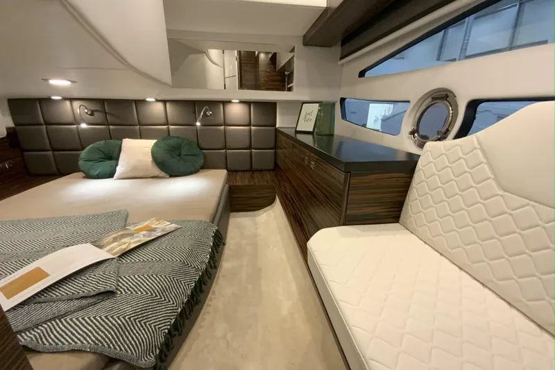 Custom Order Your 33 Ht Today! Yacht Photos Pics Luxurious interior of 2026 Cobrey 33 HT yacht with modern furnishings and elegant design.