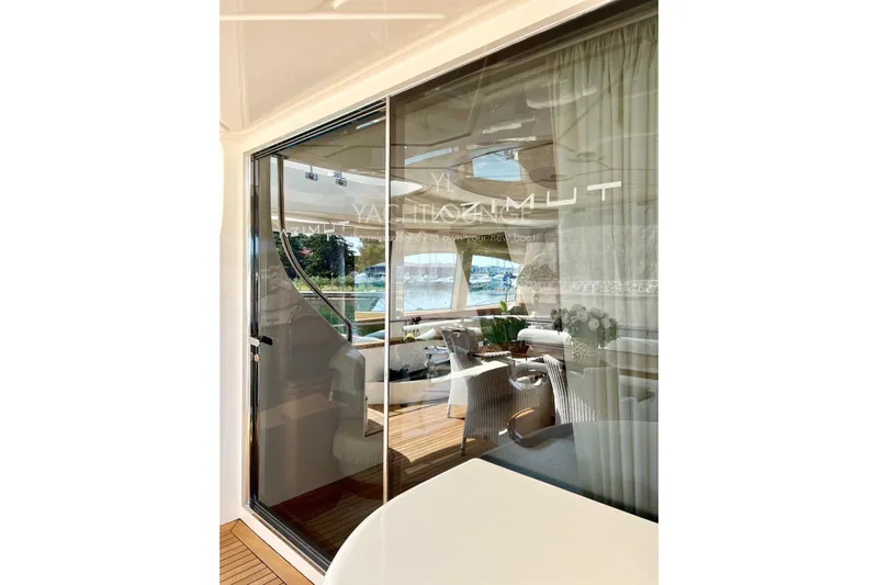  Yacht Photos Pics Luxurious interior view of 2004 Azimut 74 Solar yacht with elegant seating.