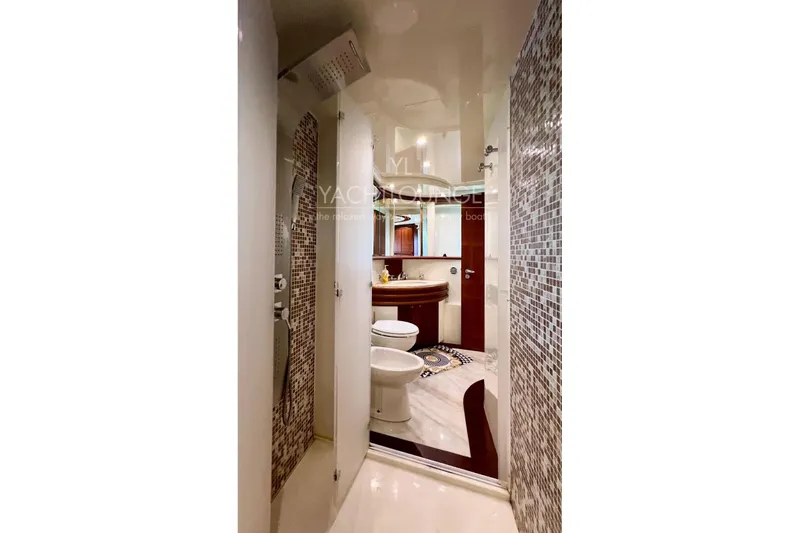  Yacht Photos Pics Luxurious bathroom on 2004 Azimut 74 Solar yacht with modern fixtures and elegant design.