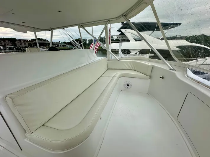 Don't Panic Yacht Photos Pics Luxurious seating area on a 2004 Viking 56 Convertible SONAR yacht.