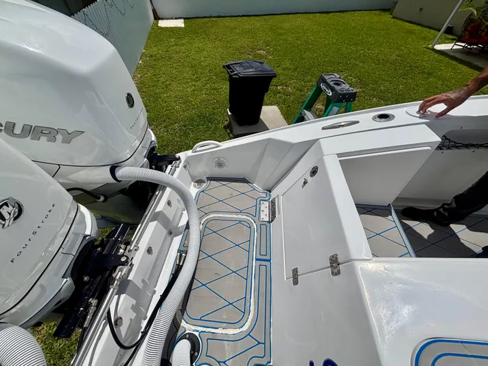  Yacht Photos Pics 2007 Midnight Express 39 Cuddy boat with Mercury FourStroke engines, docked on grass.