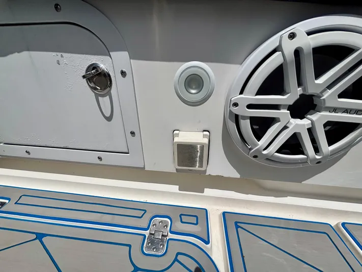  Yacht Photos Pics 2007 Midnight Express 39 Cuddy boat interior with speaker and storage compartment.