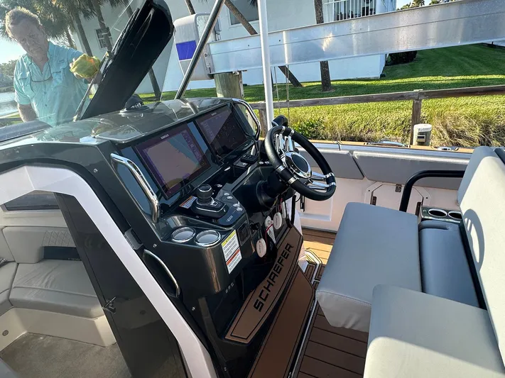 Trouble Maker Yacht Photos Pics 2022 Schaefer V33 boat cockpit with modern controls and seating.