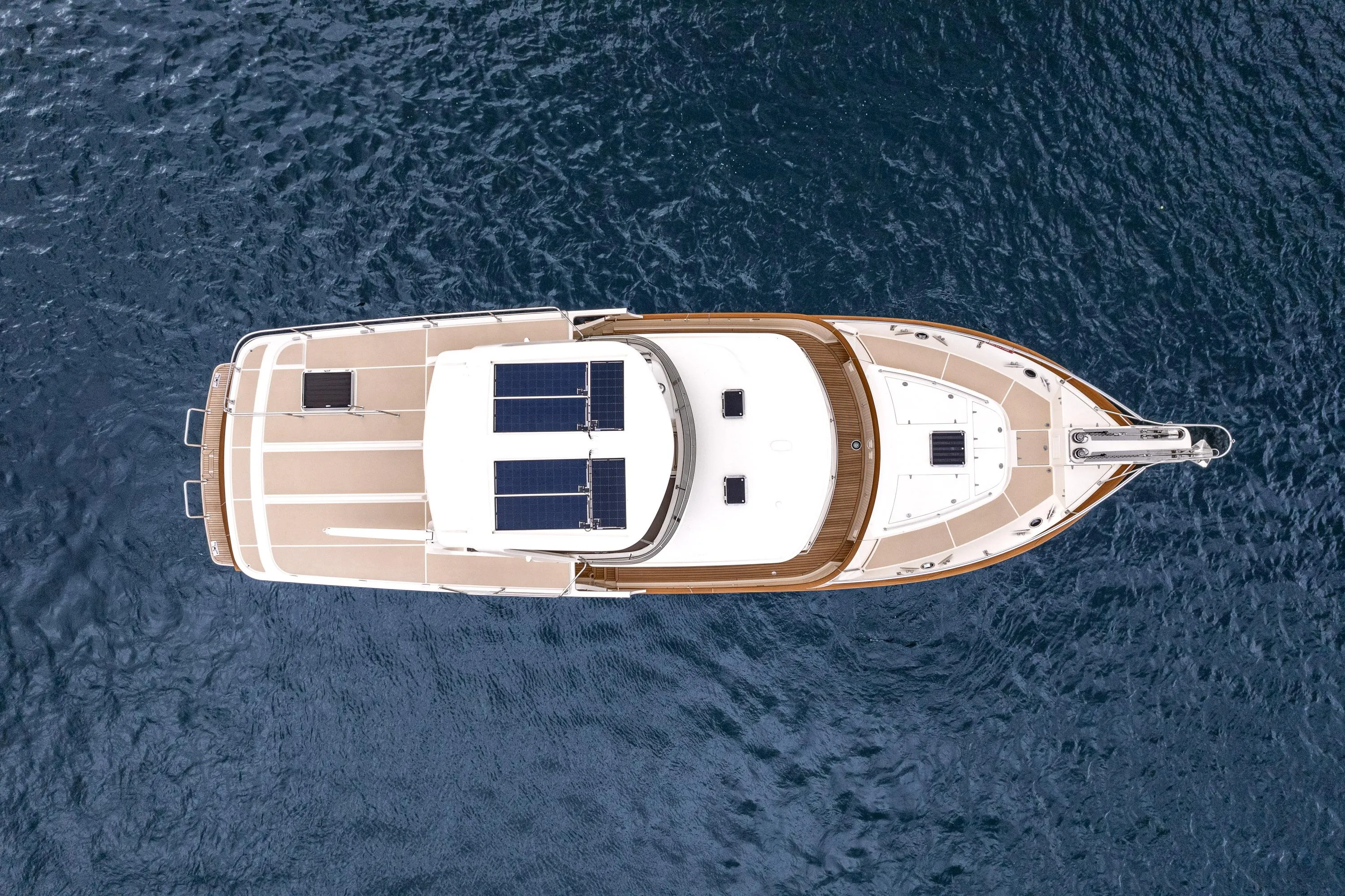Aerial view of 2024 Fleming 58 Pilothouse yacht on open water.