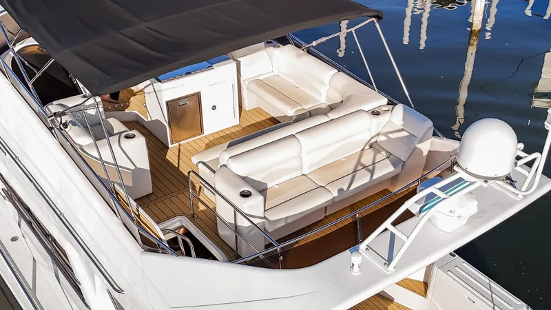  Yacht Photos Pics 1997 Viking Princess 60 Flybridge yacht with spacious seating and elegant design.