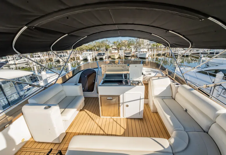  Yacht Photos Pics Luxurious 1997 Viking Princess 60 Flybridge yacht with spacious seating and elegant design.