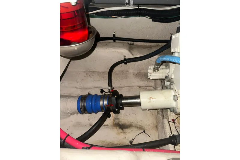 Just One More Yacht Photos Pics Engine compartment of 2005 Sea Ray 420 Sedan Bridge with visible mechanical components.