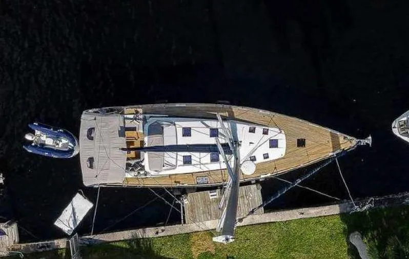Icon Yacht Photos Pics Overhead view of 2014 Beneteau Sense 55 yacht docked by the water.