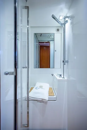 Icon Yacht Photos Pics 2014 Beneteau Sense 55 yacht bathroom with modern shower and sleek design.