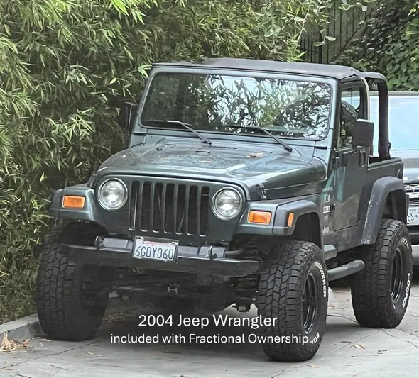 Icon Yacht Photos Pics 2004 Jeep Wrangler parked outdoors, included with fractional ownership offer.