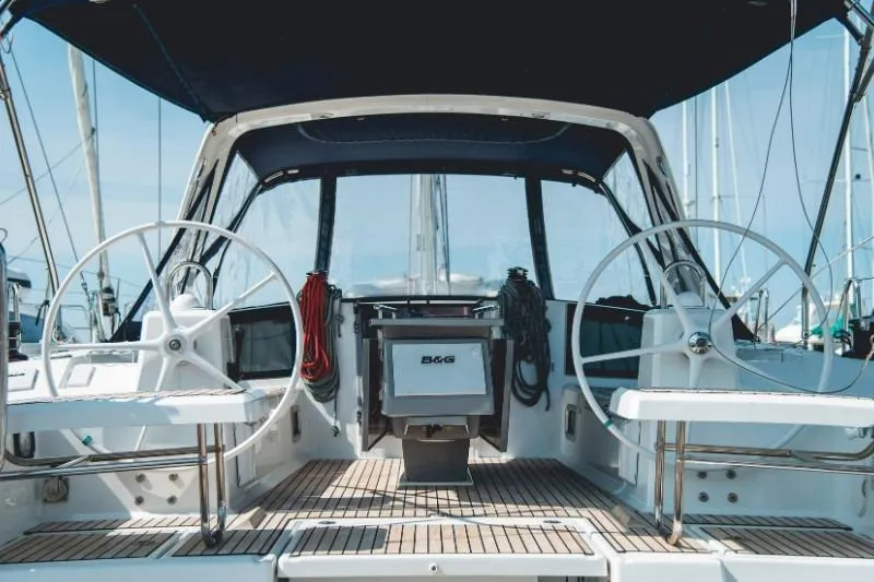  Yacht Photos Pics 2019 Beneteau Oceanis 41.1 yacht cockpit with dual steering wheels and teak flooring.