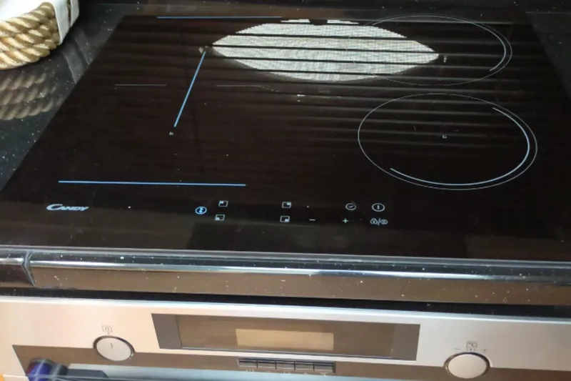  Yacht Photos Pics Modern Candy induction cooktop with touch controls on a Sunseeker Predator 62 yacht.