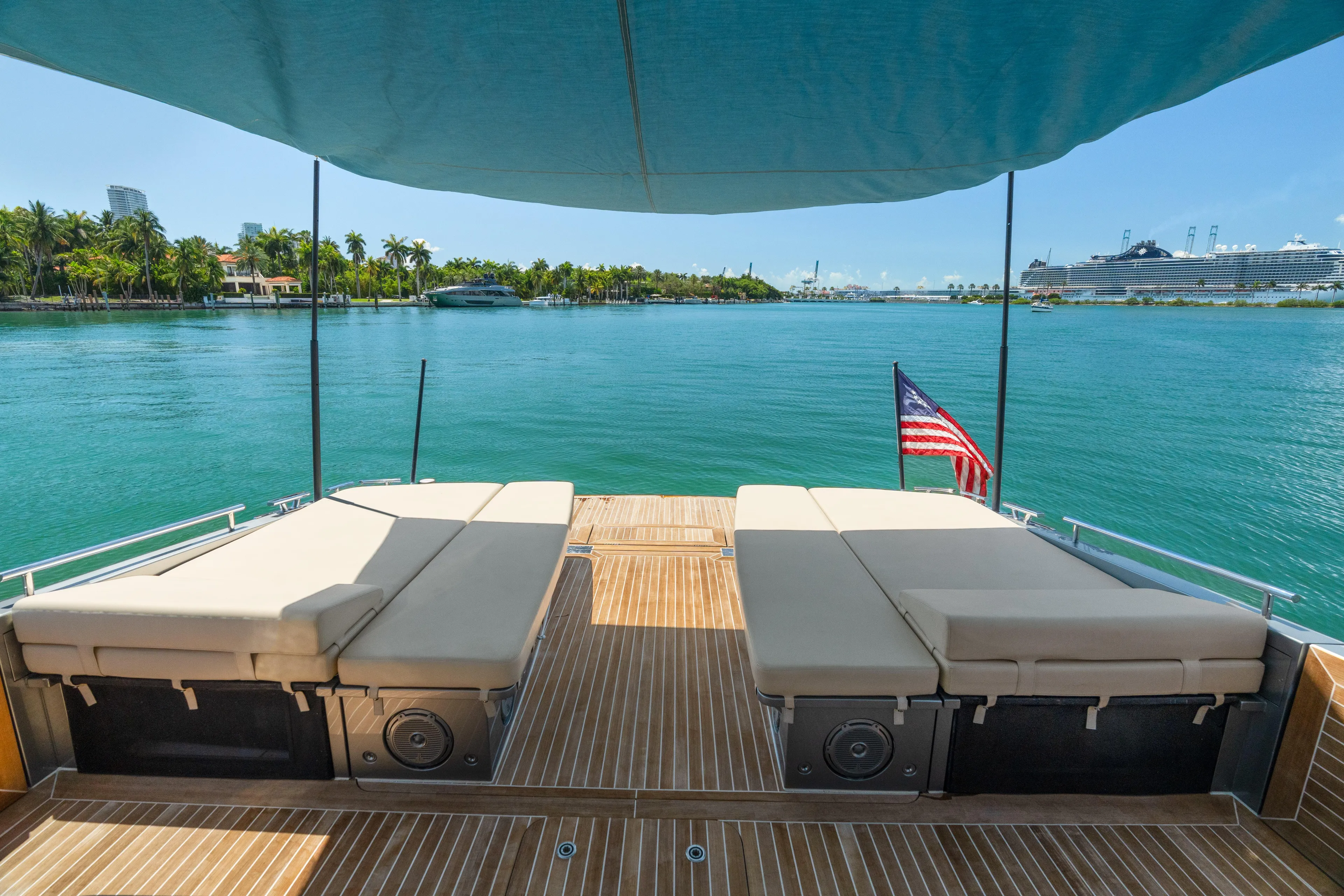 Yanina Yacht Photos Pics Luxurious 2019 CNM Continental 54T yacht deck with sun loungers and ocean view.