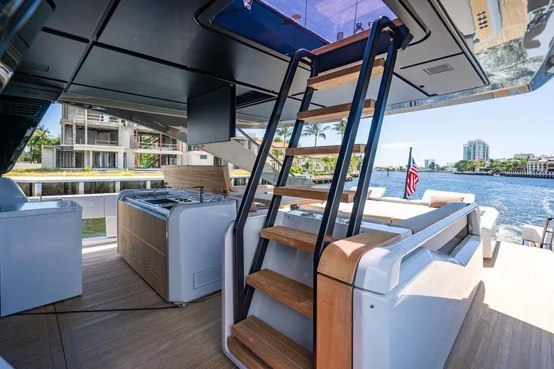 Snack Money Yacht Photos Pics Luxurious 2023 Bluegame BG 72 yacht interior with modern design and waterfront view.
