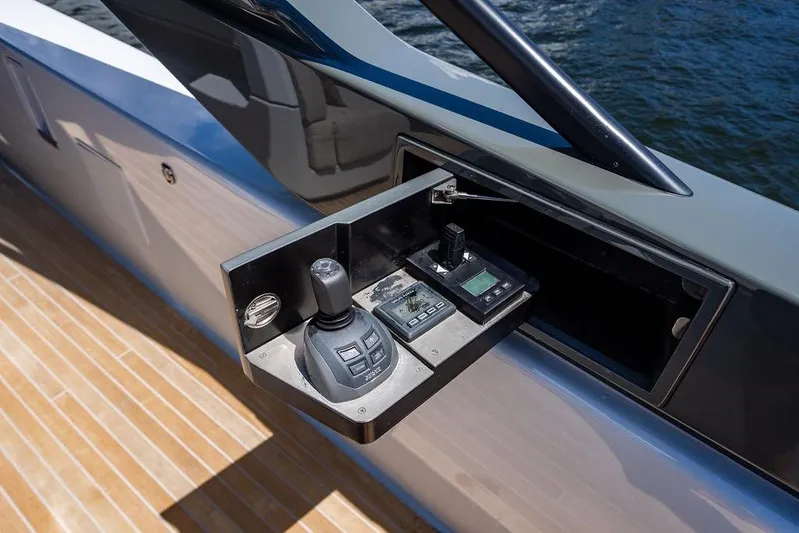 Snack Money Yacht Photos Pics Control panel of 2023 Bluegame BG 72 yacht, featuring joystick and digital displays.