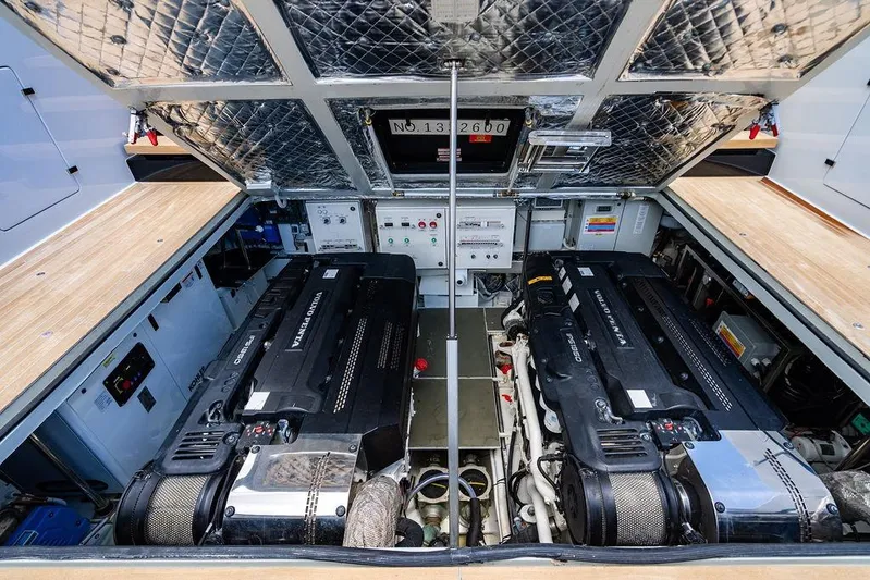 Snack Money Yacht Photos Pics Engine room of 2023 Bluegame BG 72 yacht, featuring twin Volvo Penta engines.