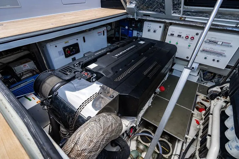 Snack Money Yacht Photos Pics Engine room of 2023 Bluegame BG 72 yacht, featuring advanced machinery and control panels.