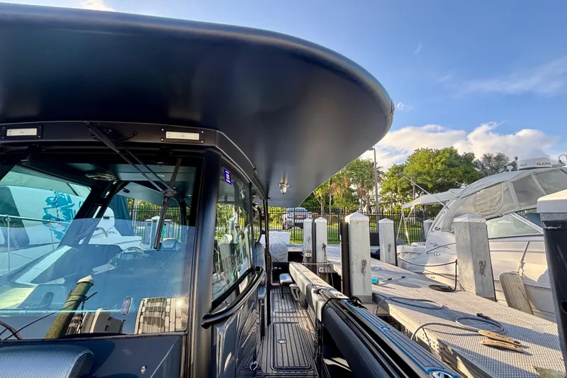  Yacht Photos Pics 2016 Hydra-Sports 4200 Siesta boat docked, showcasing sleek design and modern features.