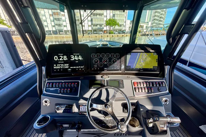  Yacht Photos Pics 2016 Hydra-Sports 4200 Siesta helm with advanced navigation and control systems.