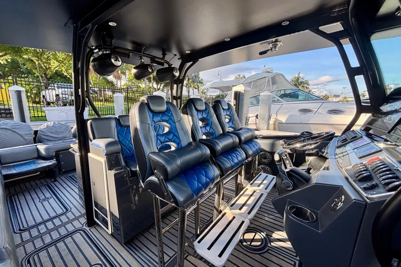  Yacht Photos Pics 2016 Hydra-Sports 4200 Siesta boat interior with luxurious seating and modern controls.