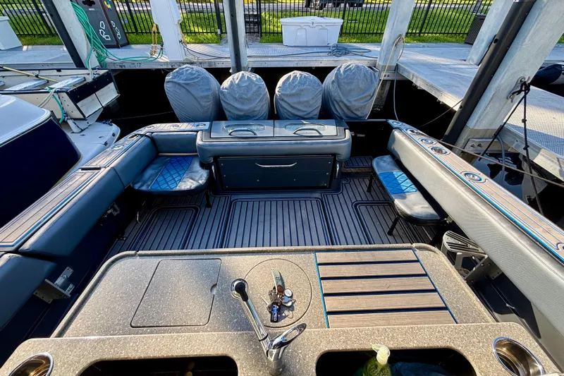  Yacht Photos Pics 2016 Hydra-Sports 4200 Siesta boat interior with seating and covered engines.