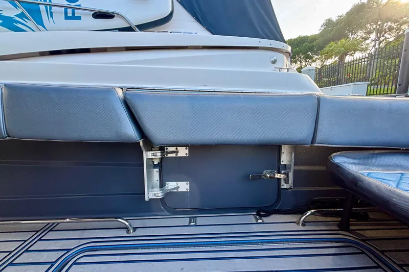  Yacht Photos Pics 2016 Hydra-Sports 4200 Siesta boat interior with cushioned seating and sleek design.