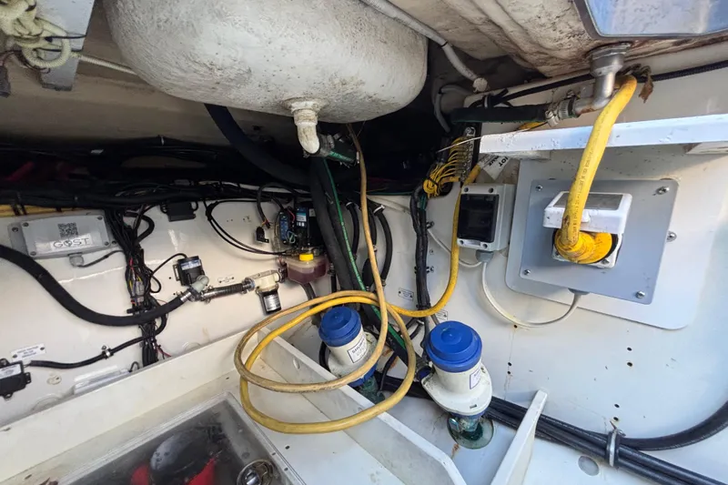 Yacht Photos Pics Engine compartment of 2016 Hydra-Sports 4200 Siesta with wiring and components visible.