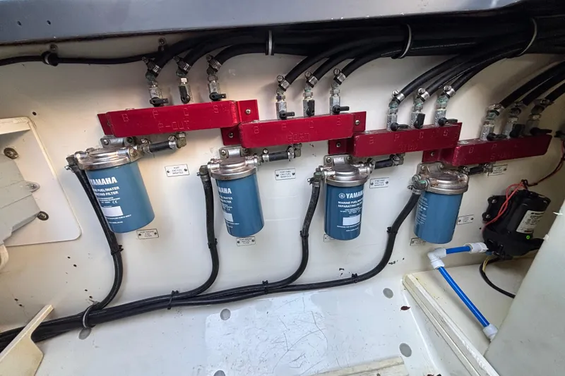  Yacht Photos Pics Engine compartment of 2016 Hydra-Sports 4200 Siesta with Yamaha fuel filters and hoses.