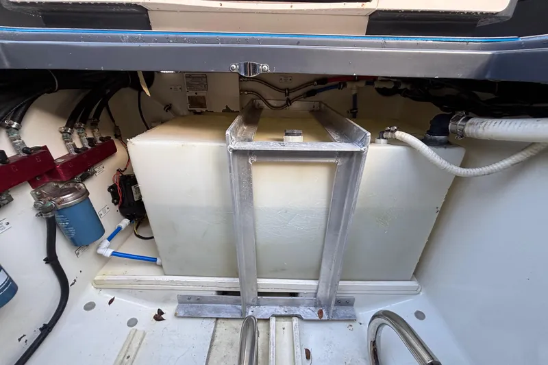  Yacht Photos Pics 2016 Hydra-Sports 4200 Siesta engine compartment with fuel tank and hoses.