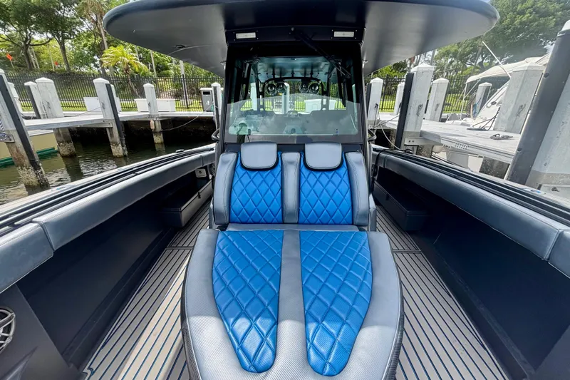  Yacht Photos Pics 2016 Hydra-Sports 4200 Siesta boat interior with blue diamond-stitched seating.