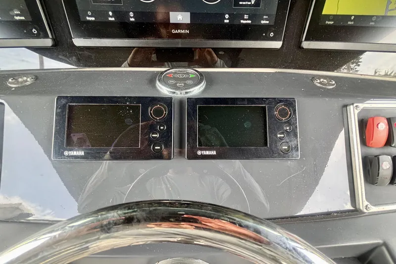  Yacht Photos Pics Control panel of a 2016 Hydra-Sports 4200 Siesta boat with Yamaha displays.
