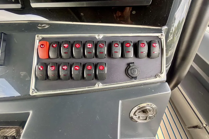  Yacht Photos Pics Control panel of a 2016 Hydra-Sports 4200 Siesta boat with labeled switches.