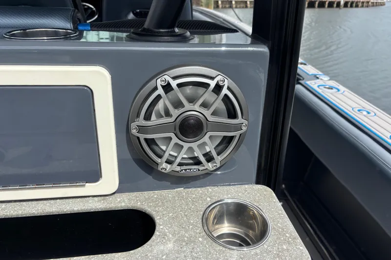  Yacht Photos Pics 2016 Hydra-Sports 4200 Siesta boat interior with JL Audio speaker and cup holder.