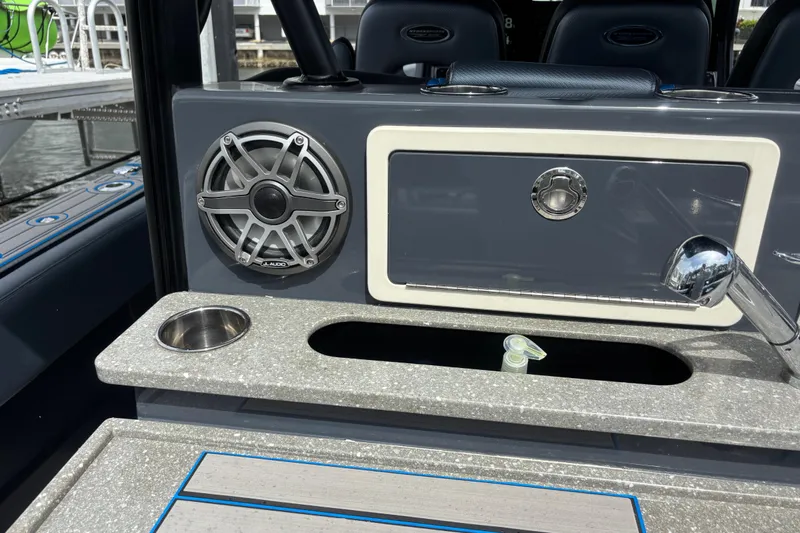  Yacht Photos Pics 2016 Hydra-Sports 4200 Siesta boat interior with speaker, faucet, and storage compartment.