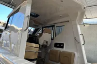 2022 Flexboat FLEX 680 EXPLORE in a modern indoor setting, showcasing sleek design and seating.
