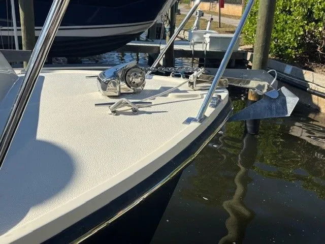 Rhode Waves Yacht Photos Pics Bow of a 2018 Eastern 27 Islander Hardback boat in harbor.