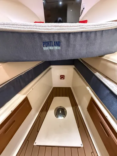 Rhode Waves Yacht Photos Pics Interior of a 2018 Eastern 27 Islander Hardback boat with Portland boat mattress.