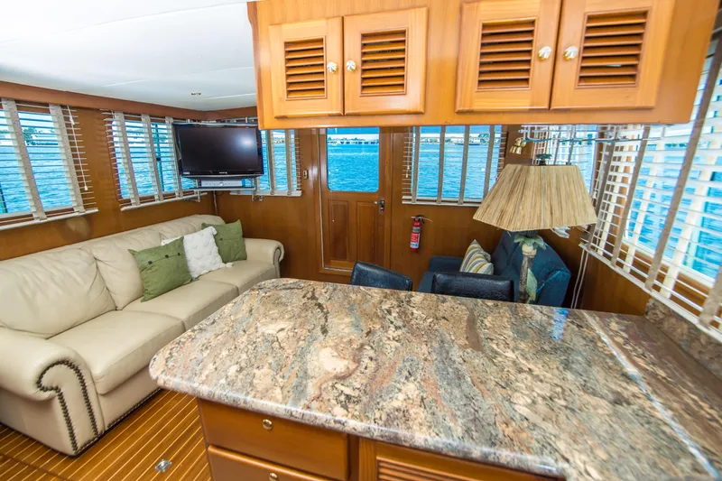 Papagayo Yacht Photos Pics Luxurious interior of 2008 North Pacific 43 Pilothouse yacht with elegant furnishings.