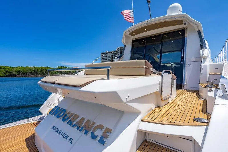Endurance Yacht Photos Pics Azimut Atlantis 50 yacht, 2016 model, docked with clear blue sky and water.