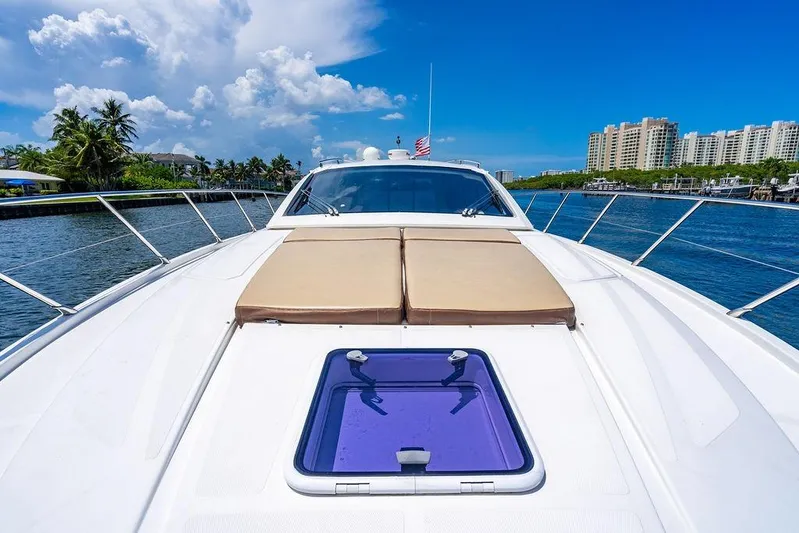 Endurance Yacht Photos Pics Luxurious 2016 Azimut Atlantis 50 yacht cruising on a sunny day, featuring spacious deck.