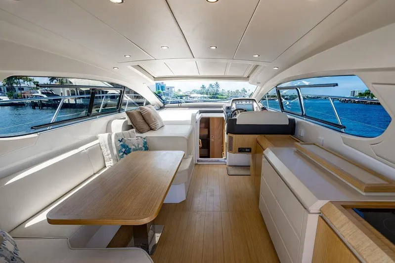 Endurance Yacht Photos Pics Luxurious interior of 2016 Azimut Atlantis 50 yacht with elegant seating and scenic views.