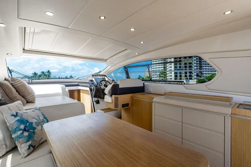 Endurance Yacht Photos Pics Luxurious interior of 2016 Azimut Atlantis 50 yacht with modern furnishings and scenic view.