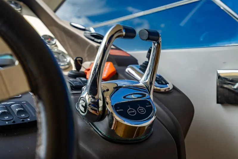 Endurance Yacht Photos Pics Control panel of 2016 Azimut Atlantis 50 yacht, featuring sleek chrome throttle levers.