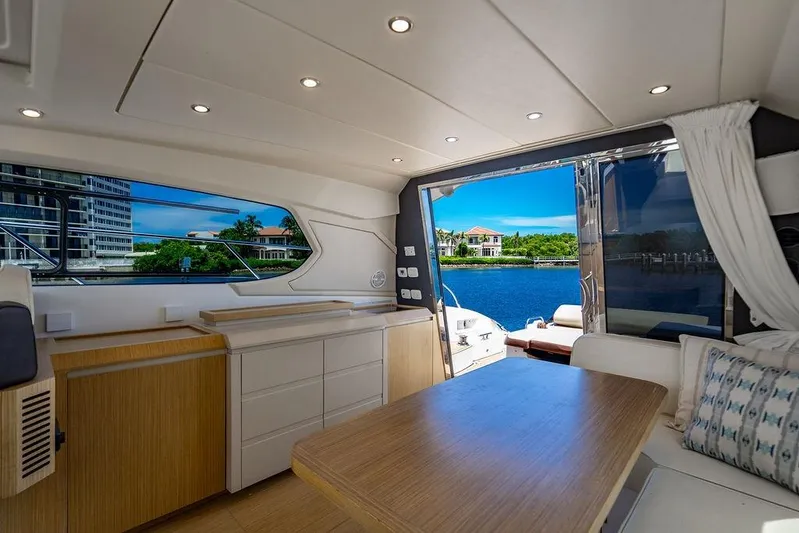 Endurance Yacht Photos Pics Luxurious interior of 2016 Azimut Atlantis 50 yacht with scenic waterfront view.