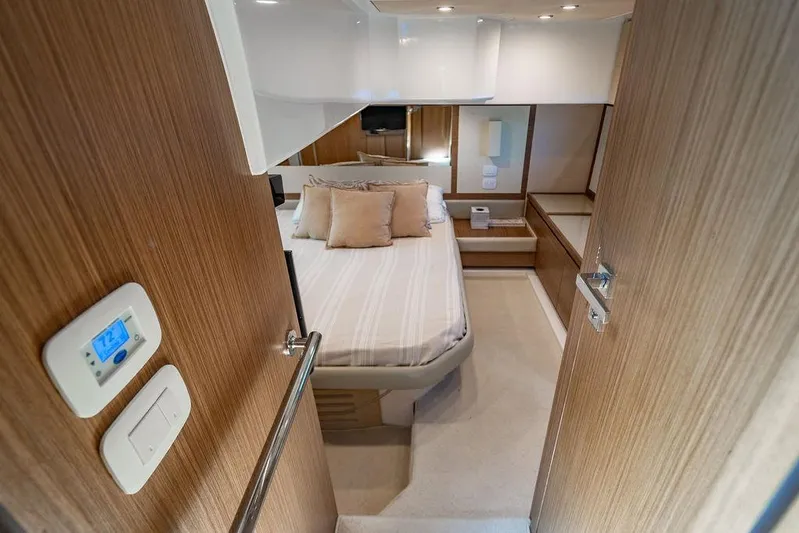 Endurance Yacht Photos Pics Luxurious bedroom interior of 2016 Azimut Atlantis 50 yacht with modern design.